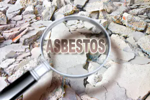 What does an asbestos survey involve?